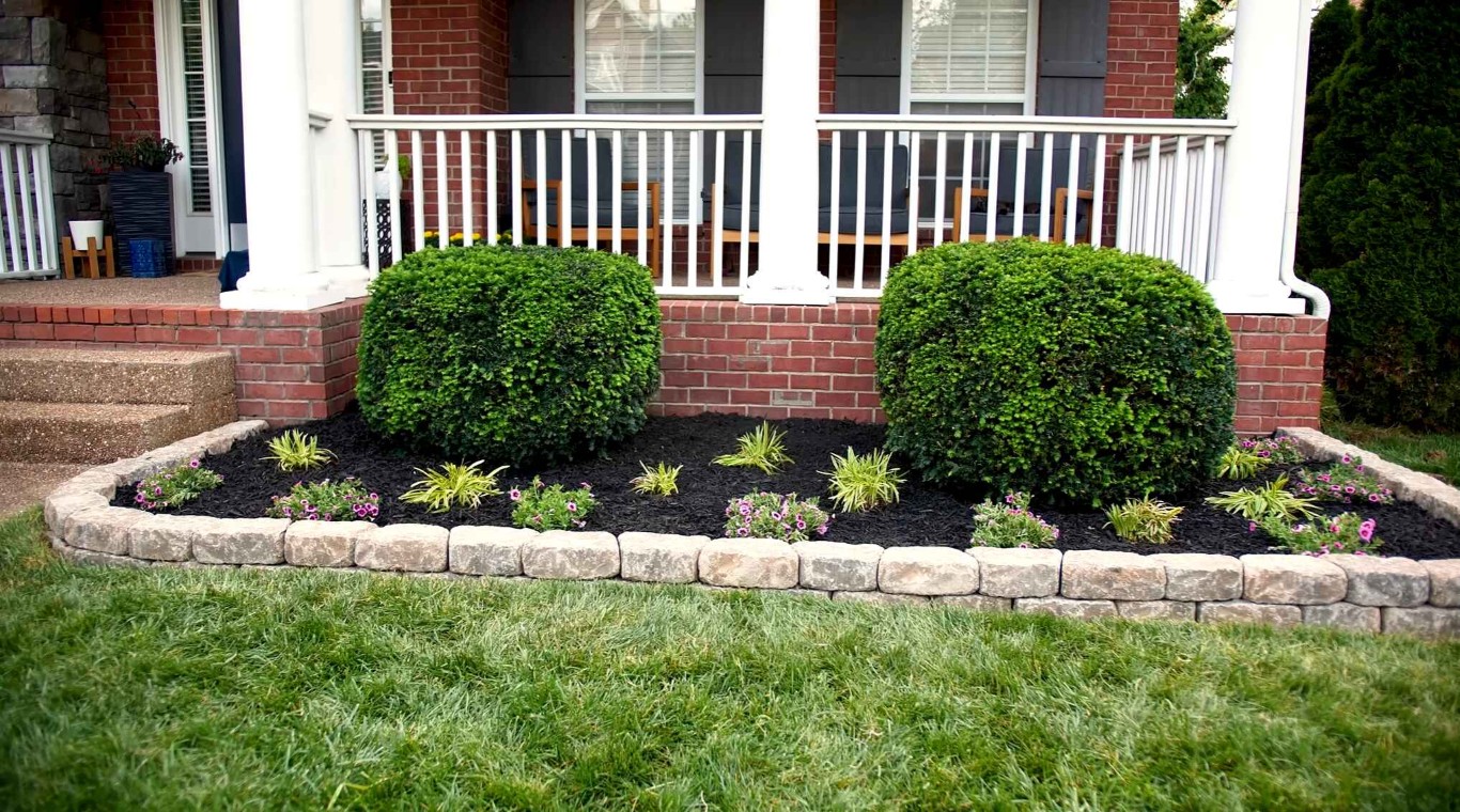 Mulching and flower bed maintenance for front yard landscaping